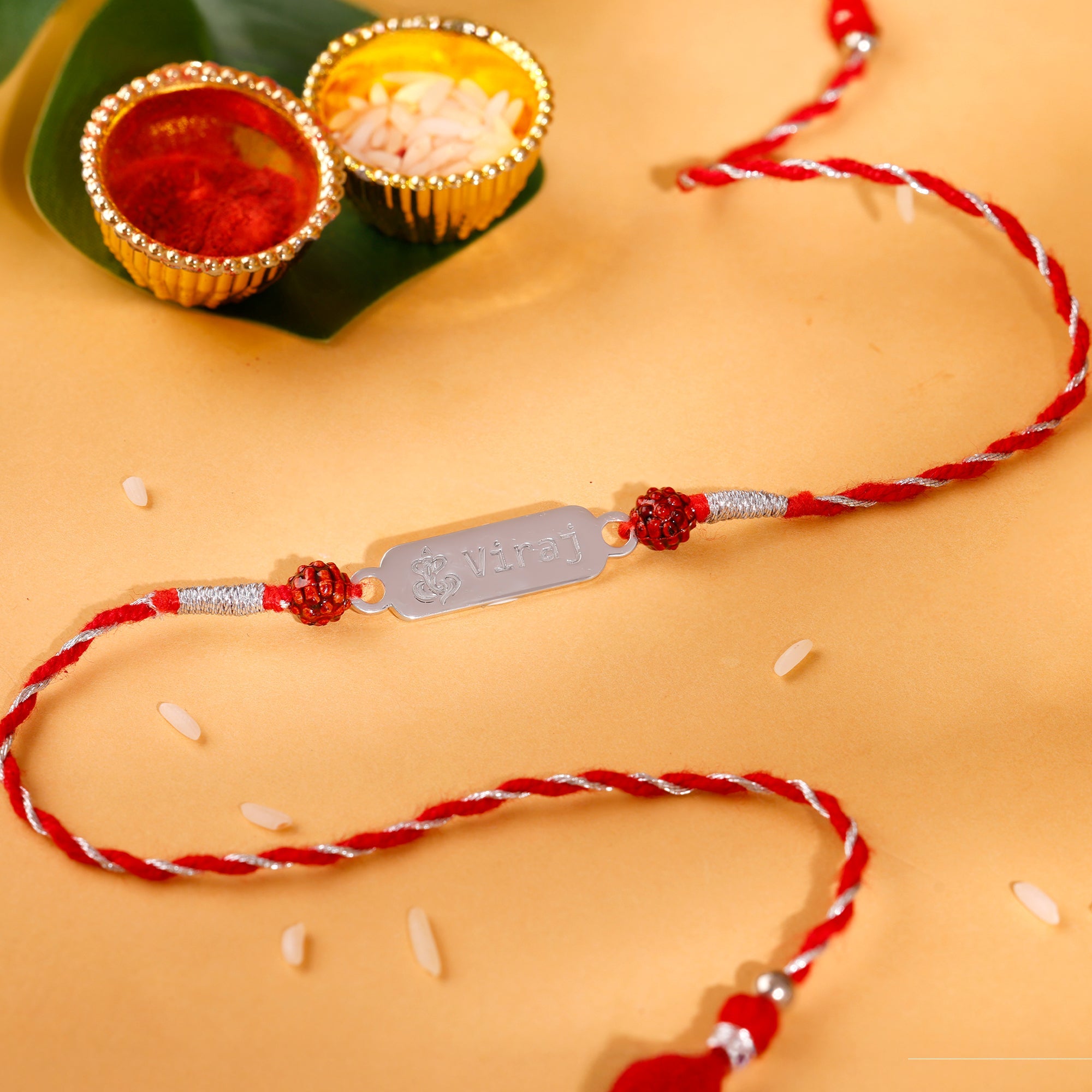 Silver Personalised Ganpati Name Rudraksh Rakhi — image 1