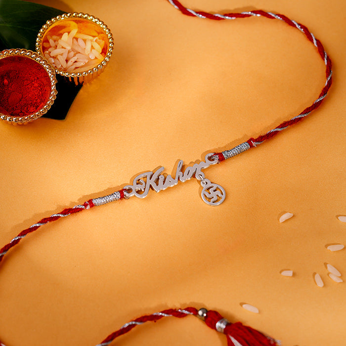 Silver Personalised Name Swastika Chakra Rakhi — image 1