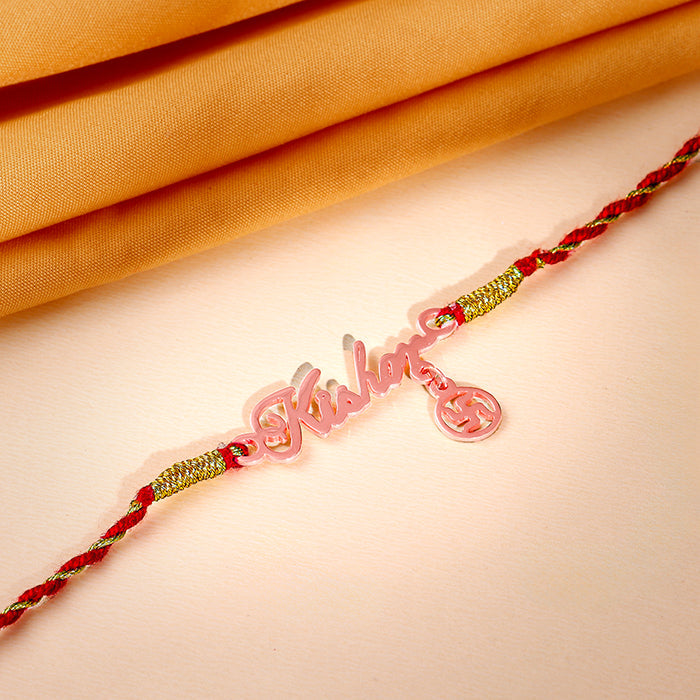 Rose Gold Personalised Name Swastika Chakra Rakhi — image 1
