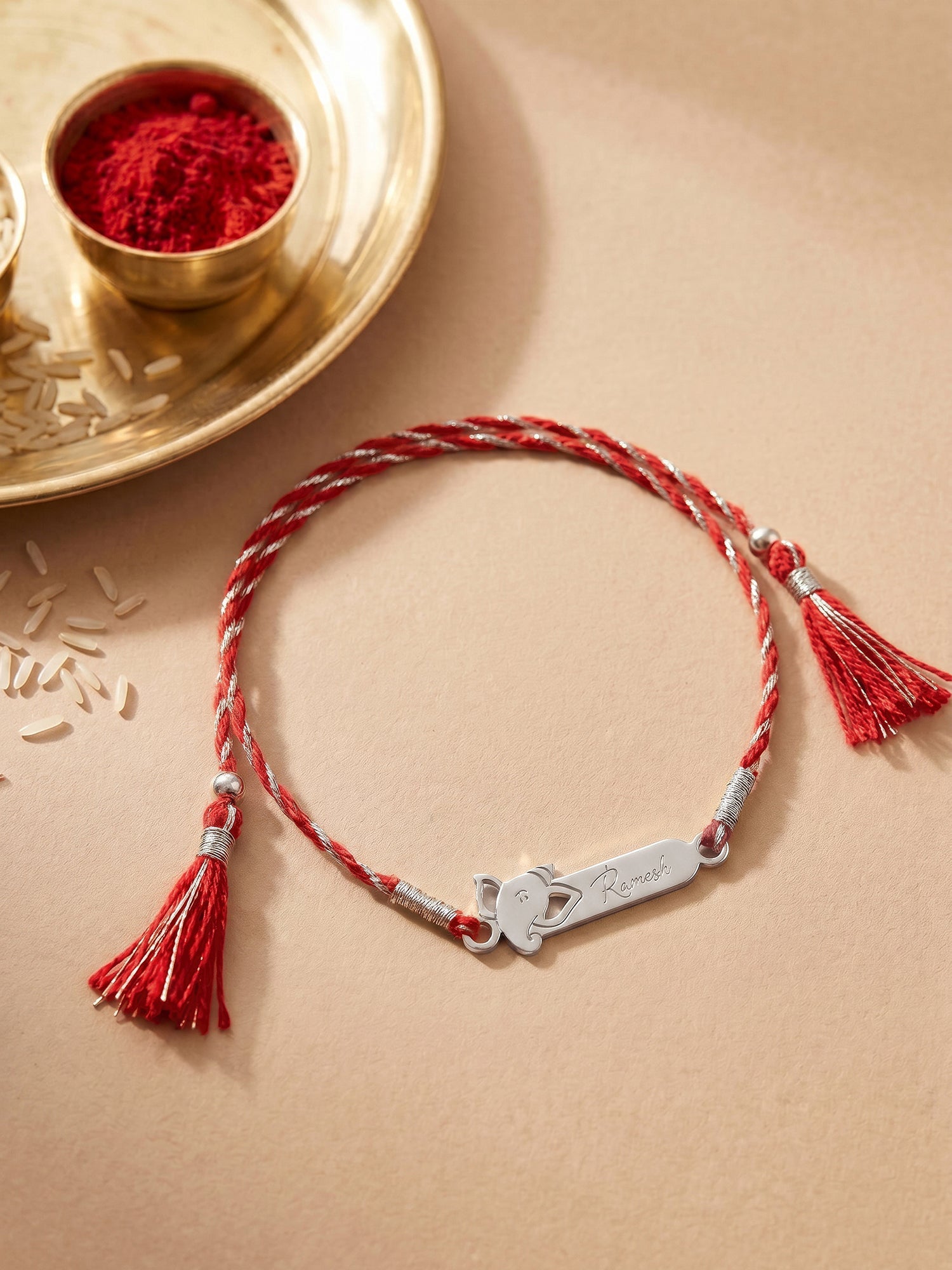 Silver Personalised Sacred Ganesha Rakhi — image 1