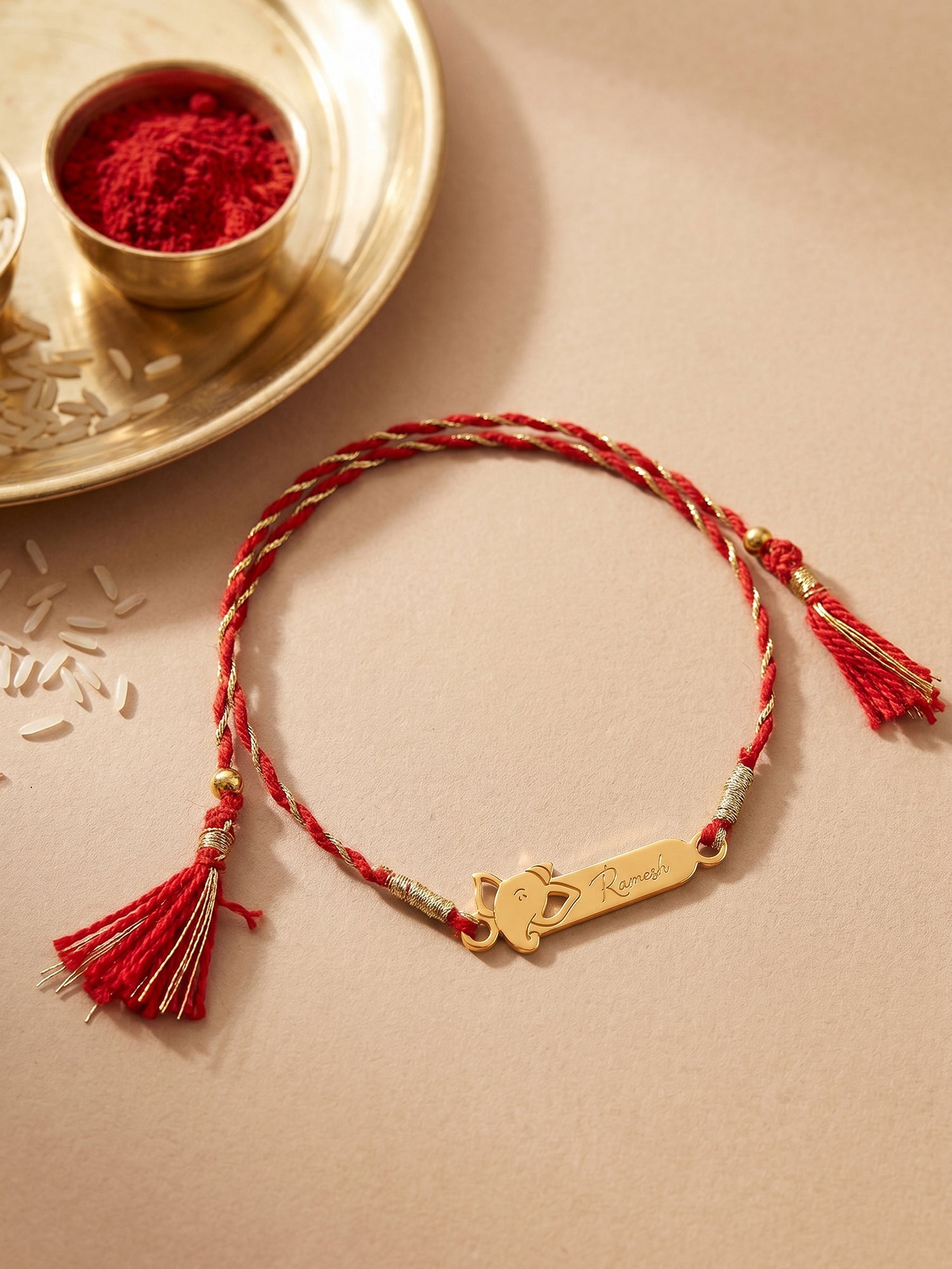 Golden Personalised Sacred Ganesha Rakhi — image 1