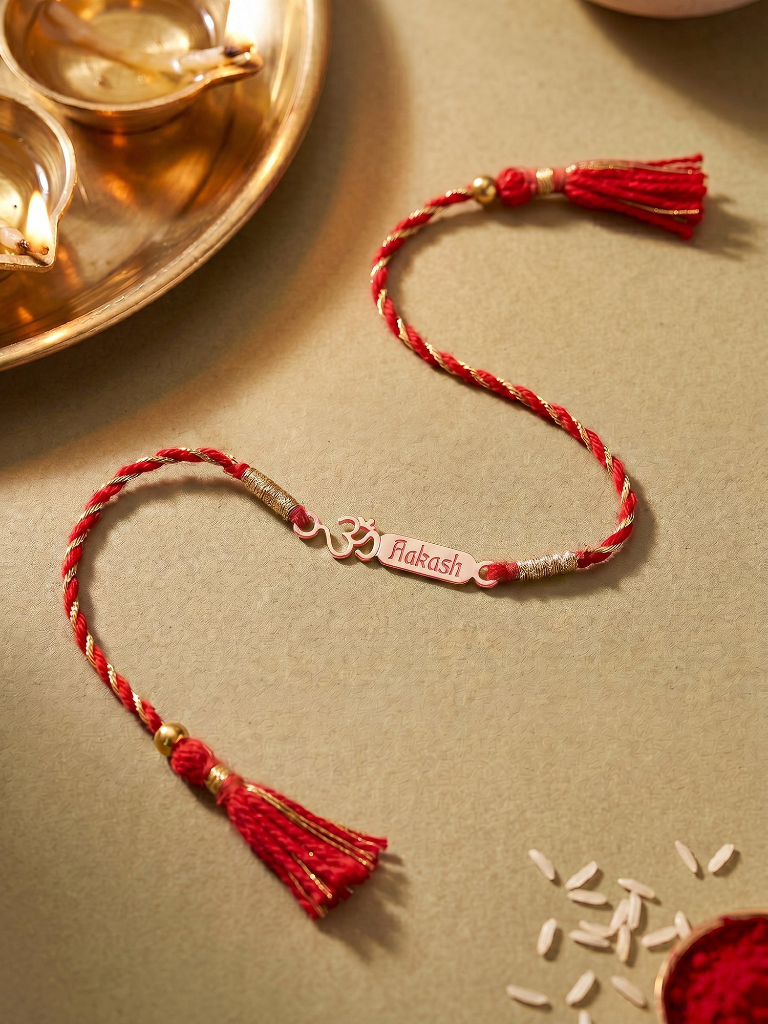 Rose Gold Personalised Om Blessing Rakhi — image 1