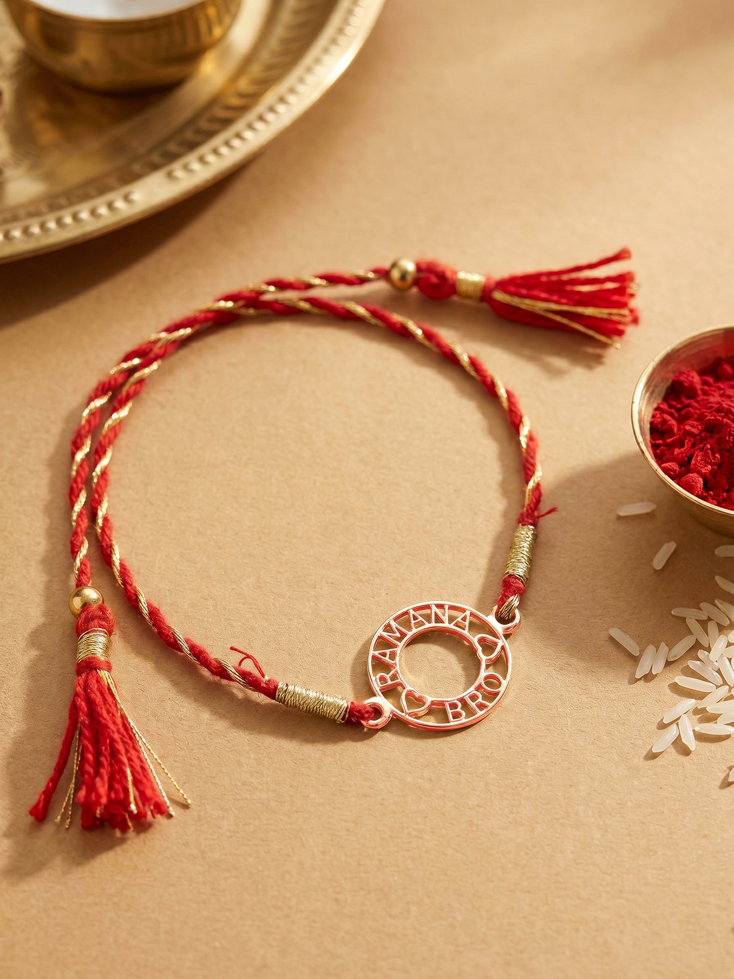 Rose Gold Personalised Aura Circle Rakhi — image 1