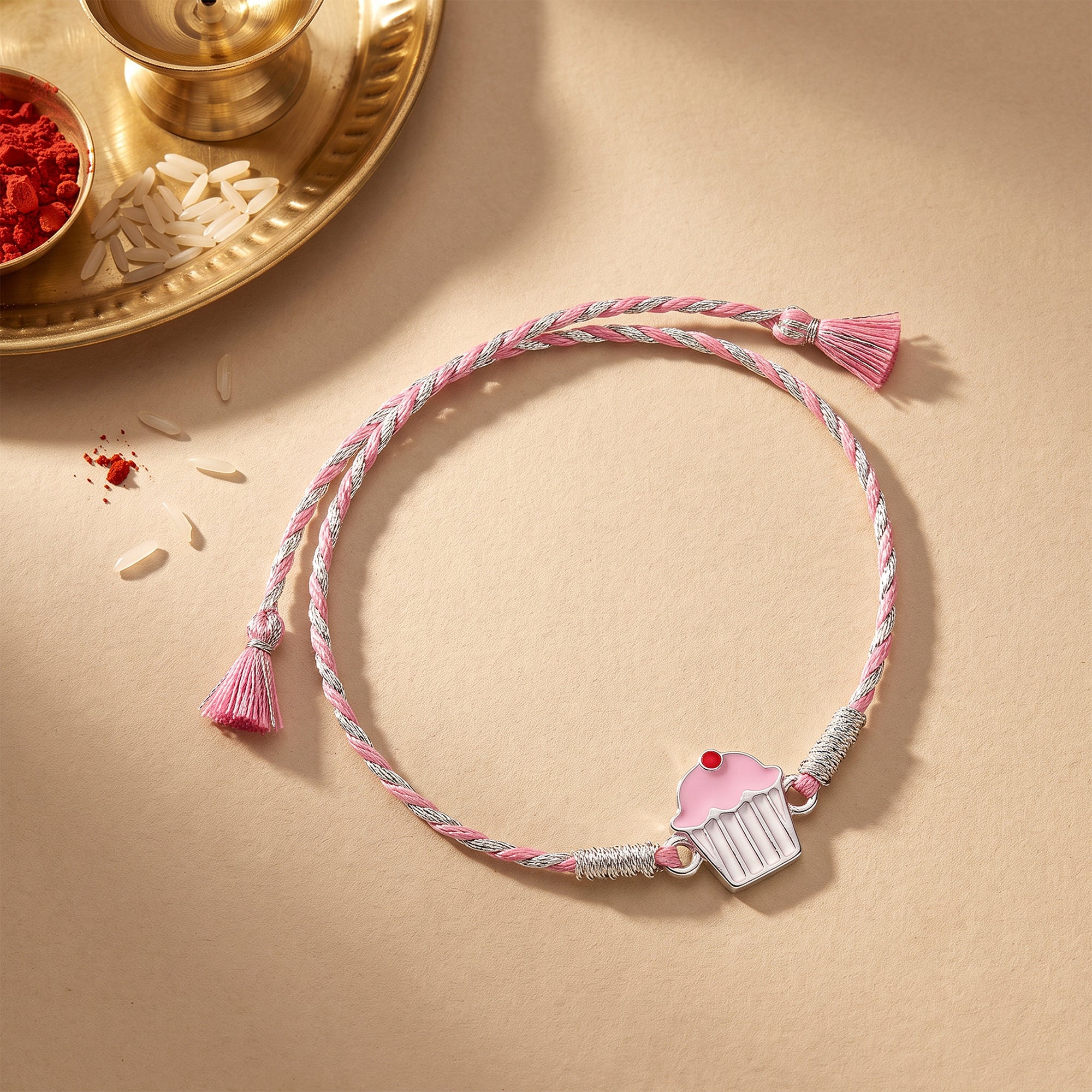 Silver Cup Cake Rakhi for Kids — image 1