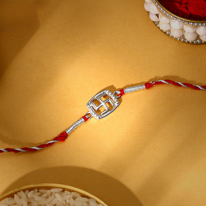 Silver Swastik In Square Rakhi — image 1