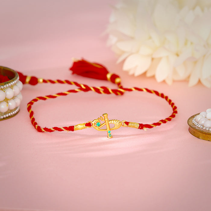 Golden Flute Rakhi — image 1