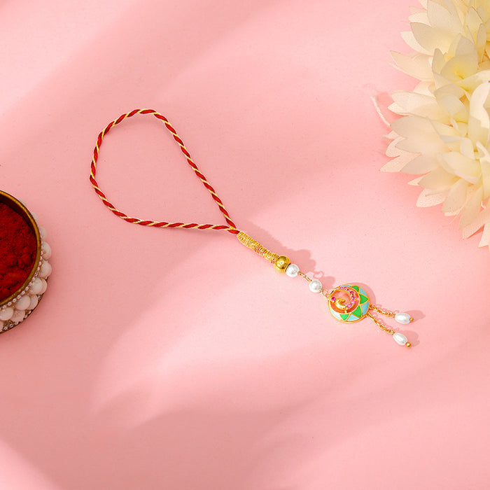 Golden Peacock Lumba Rakhi — image 1