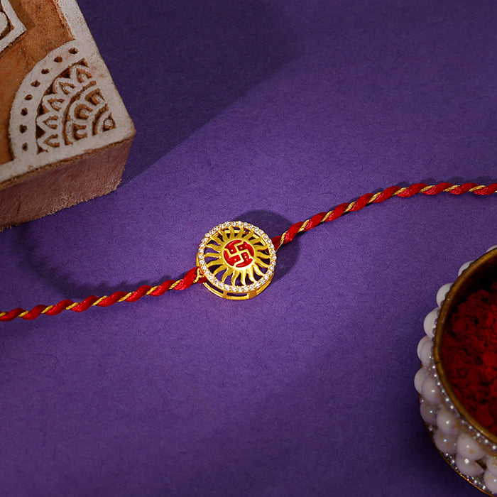 Golden Swastik Chakra Rakhi — image 1
