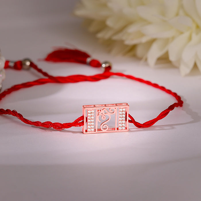 Rose Gold Spiritual Om Rakhi — image 1