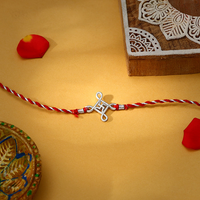 Silver Minimal Swastika Rakhi — image 1