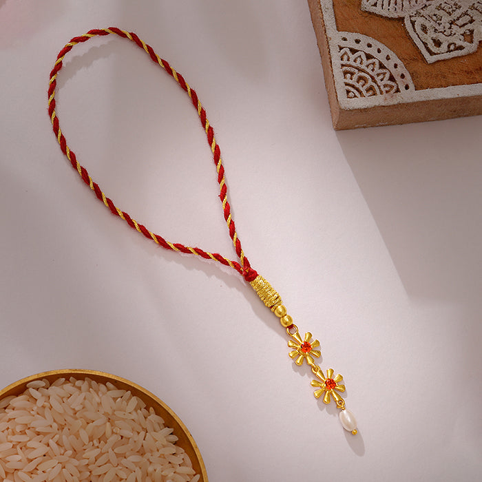 Golden Floral Lumba Rakhi — image 1