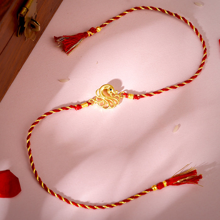 Golden Peacock Rakhi — image 1