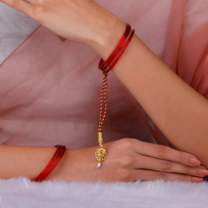 Golden Pearl Peacock Lumba Rakhi — image 2