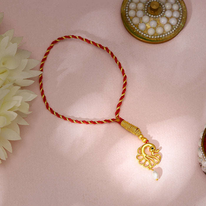 Golden Pearl Peacock Lumba Rakhi — image 1