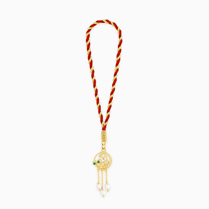 Golden Dangling Pearls Peacock Lumba Rakhi — image 3