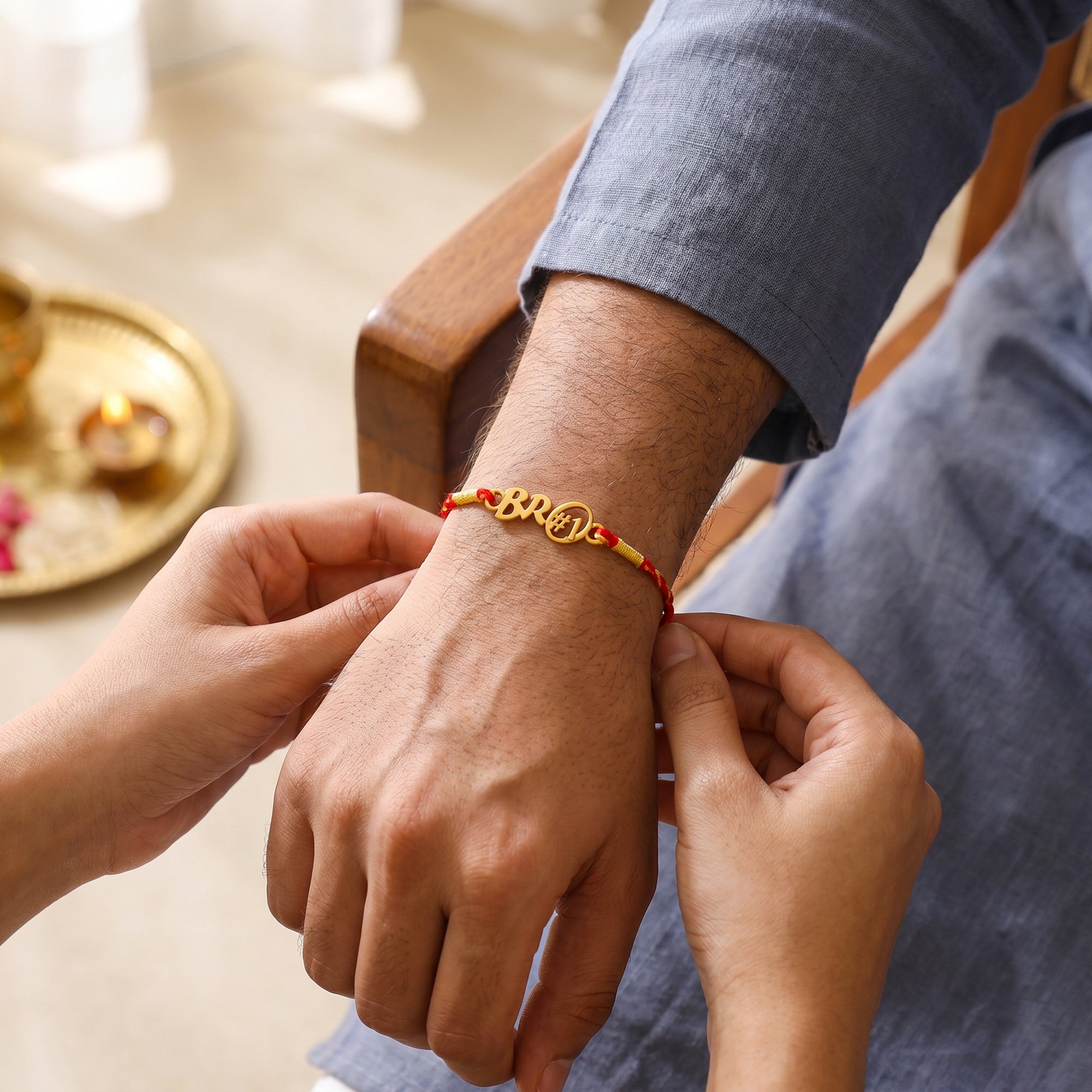 Golden Nairik Bhaiya Bhabhi Rakhi Combo (Set of 2) — image 2