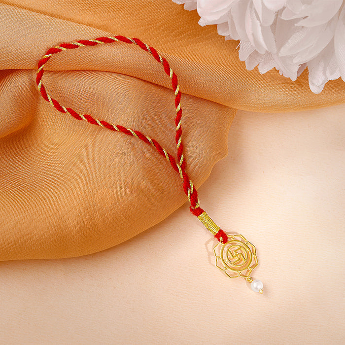 Golden Divya Swastik Lumba Rakhi — image 1