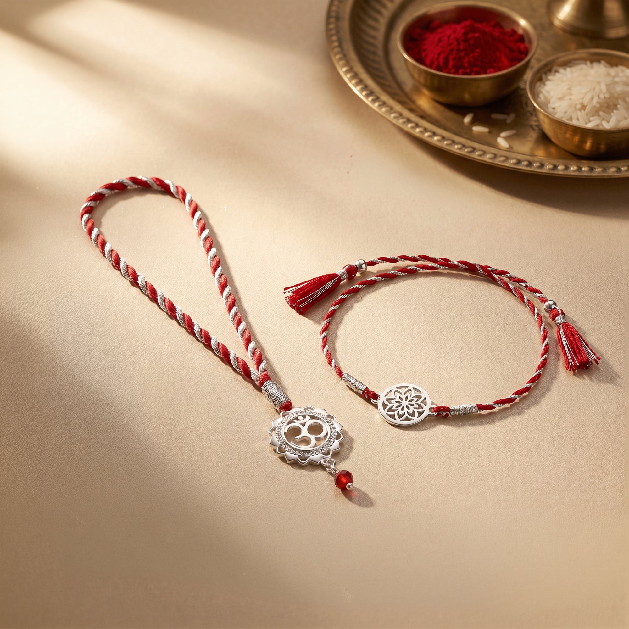 Silver Kairav Bhaiya Bhabhi Rakhi Combo (Set of 2) — image 1