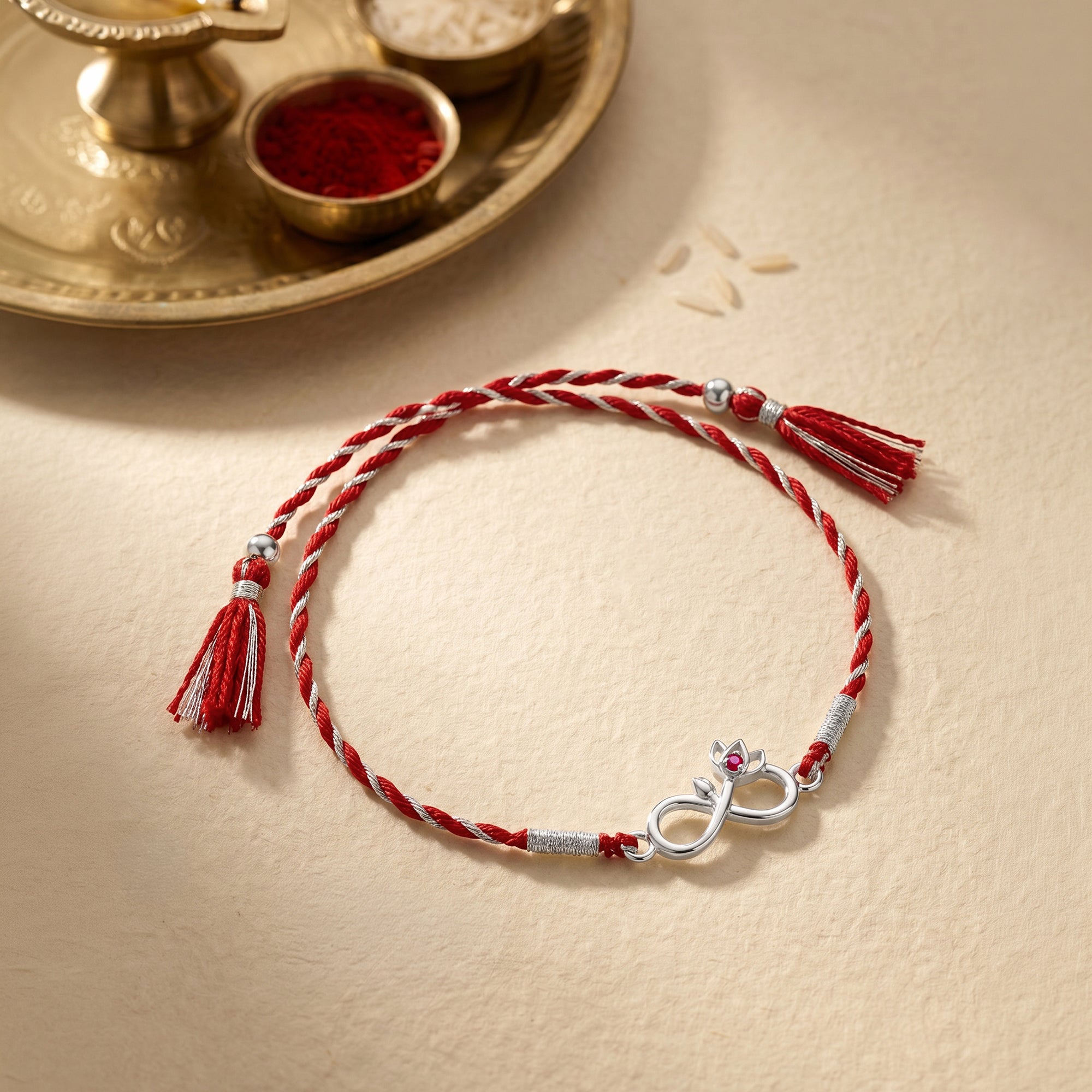Silver Infinity Lotus Rakhi — image 1