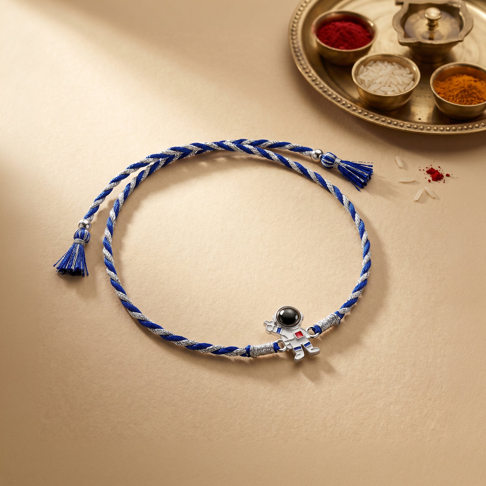 Silver Astronaut Kids Rakhi — image 1