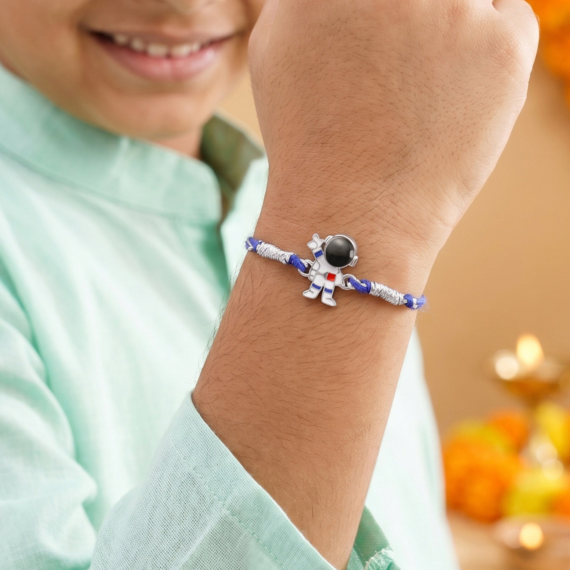 Silver Astronaut Kids Rakhi — image 2