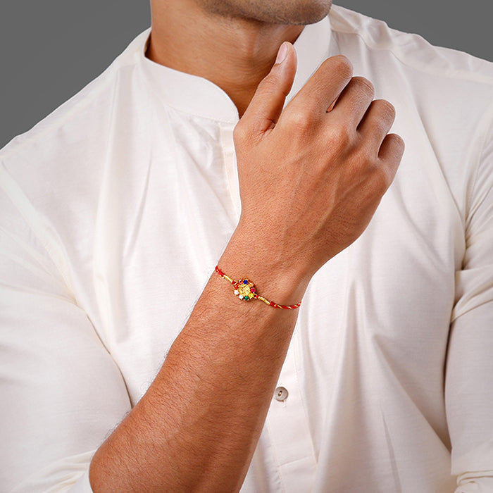 Golden Floral Om Rakhi — image 2