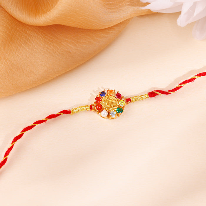 Golden Floral Om Rakhi — image 1