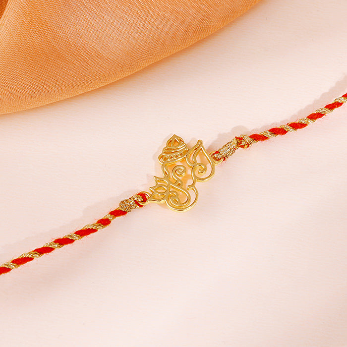 Golden Ganesha Lotus Rakhi — image 1