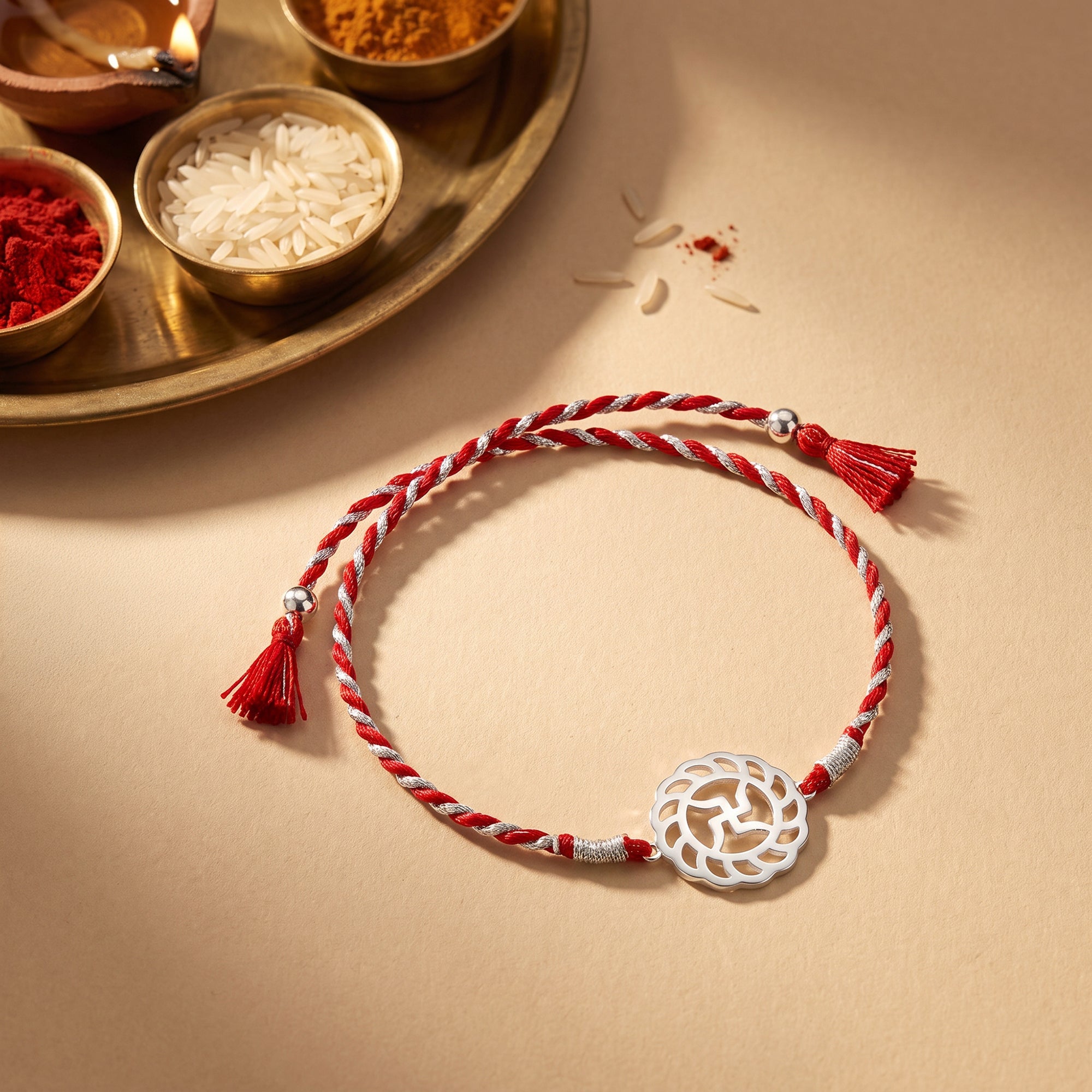 Silver Auspicious Rakhi — image 1