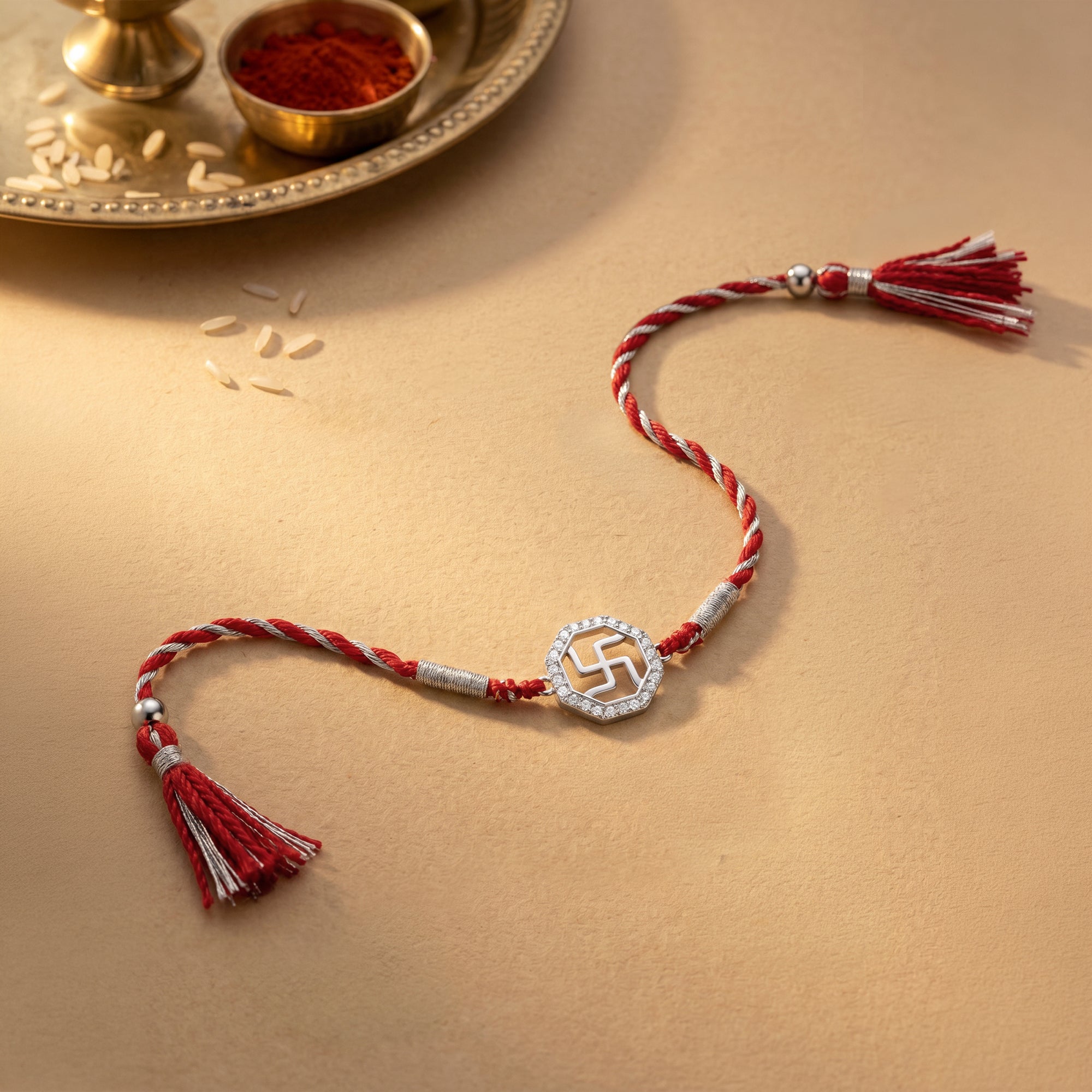 Silver Vintage Swastik Rakhi — image 1
