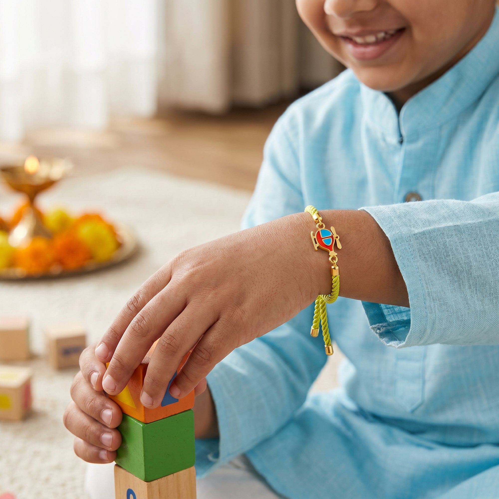 Golden Spinning Chopper Kids Rakhi — image 2