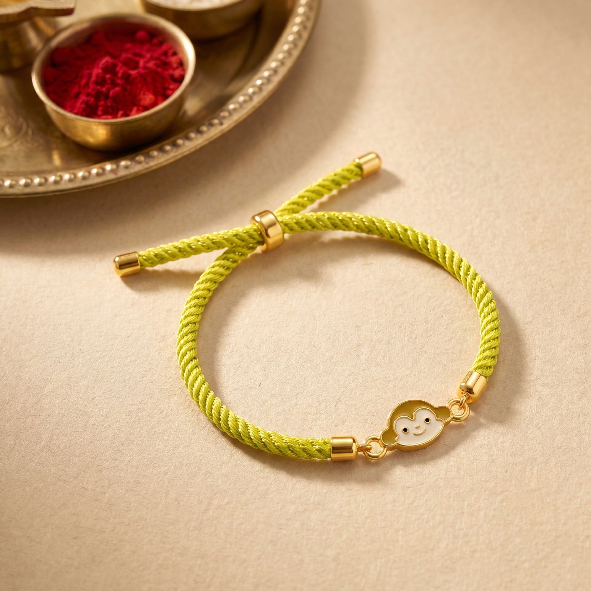 Golden Monkey Charm Kids Rakhi — image 1