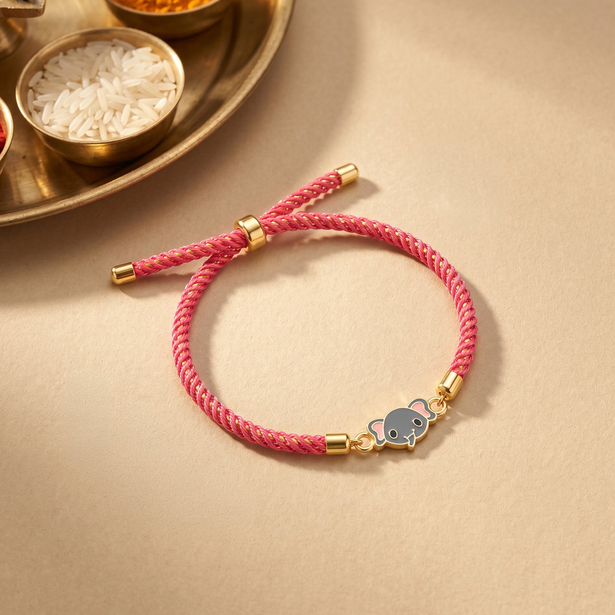 Golden Baby Elephant Kids Rakhi — image 1