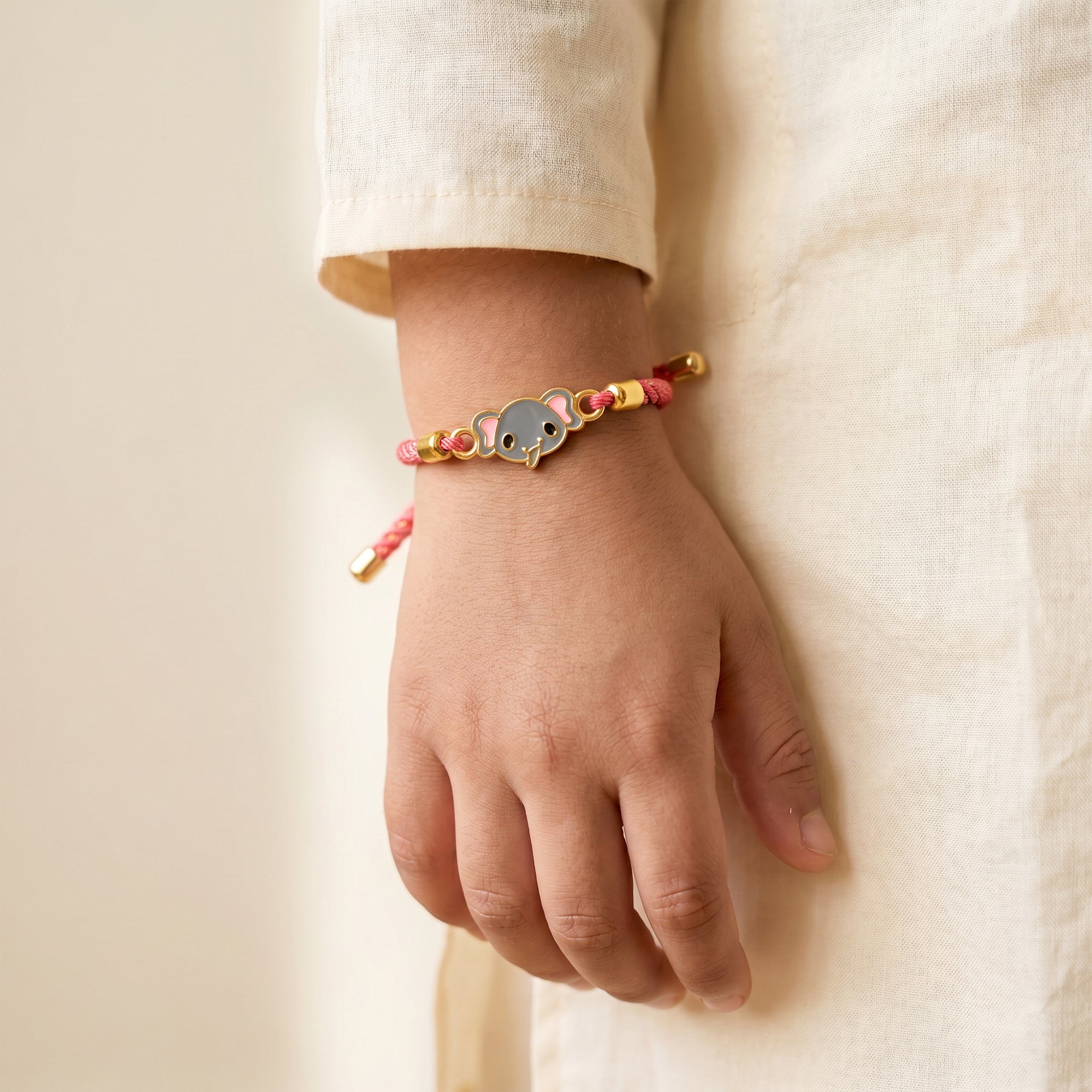 Golden Baby Elephant Kids Rakhi — image 2