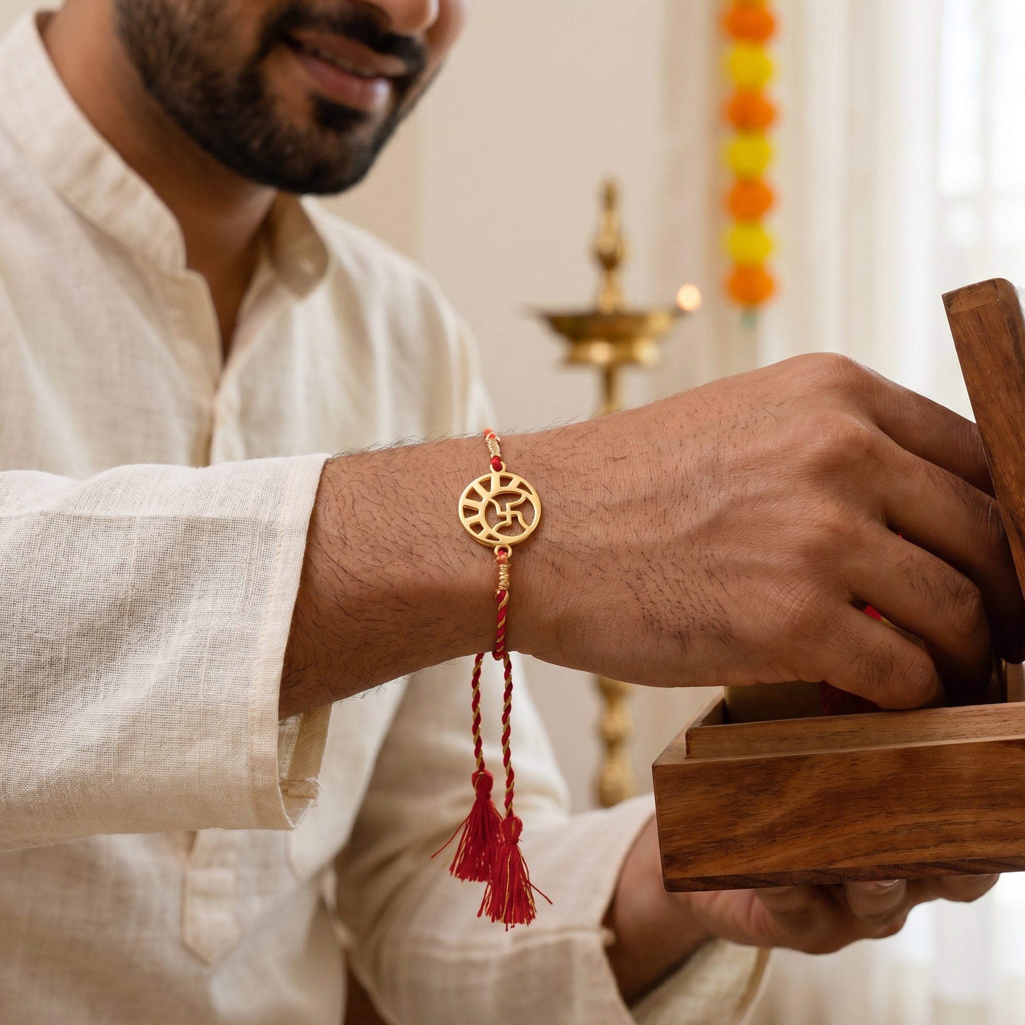 Golden Swastik Kavach Rakhi — image 2