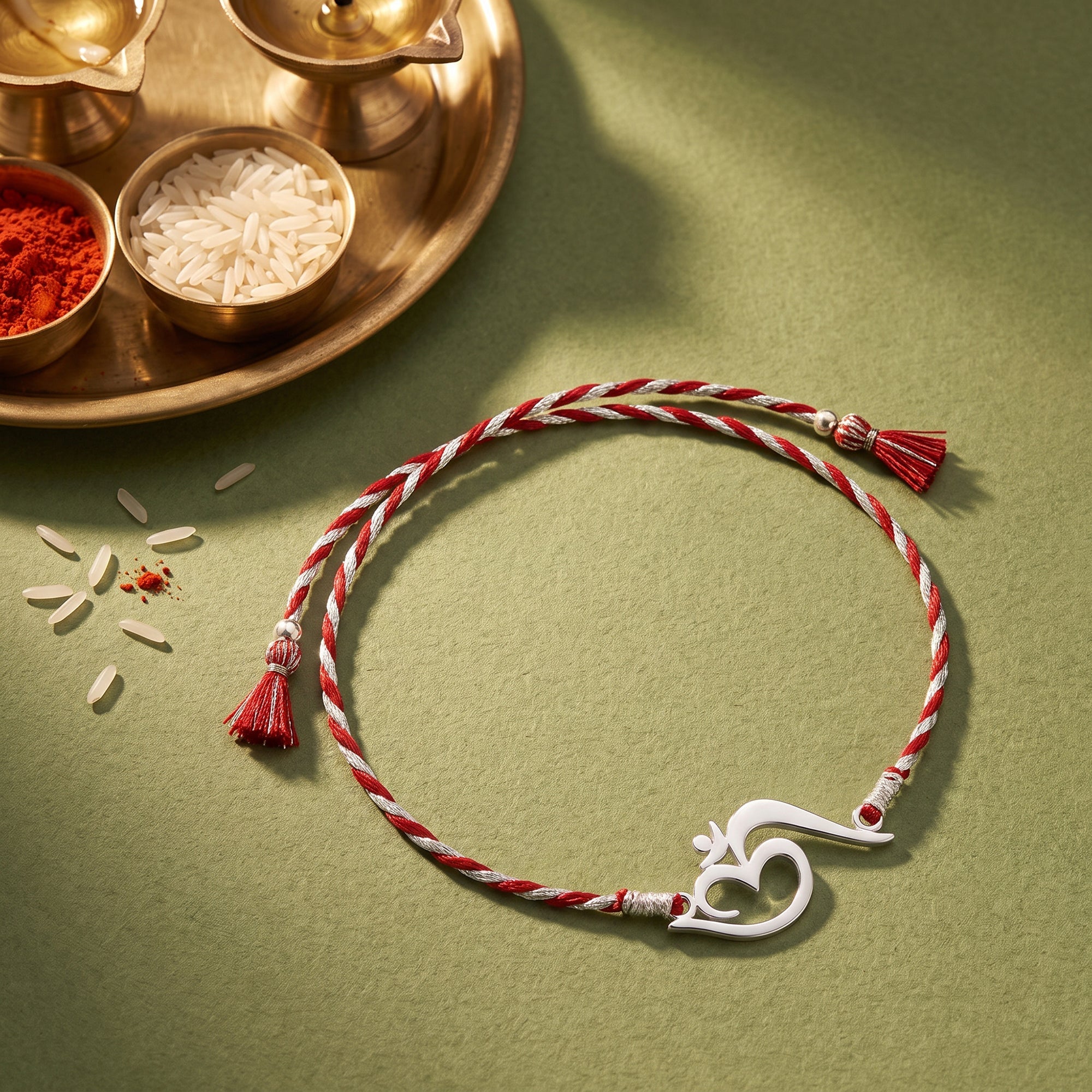 Silver Stylish Om Rakhi — image 1