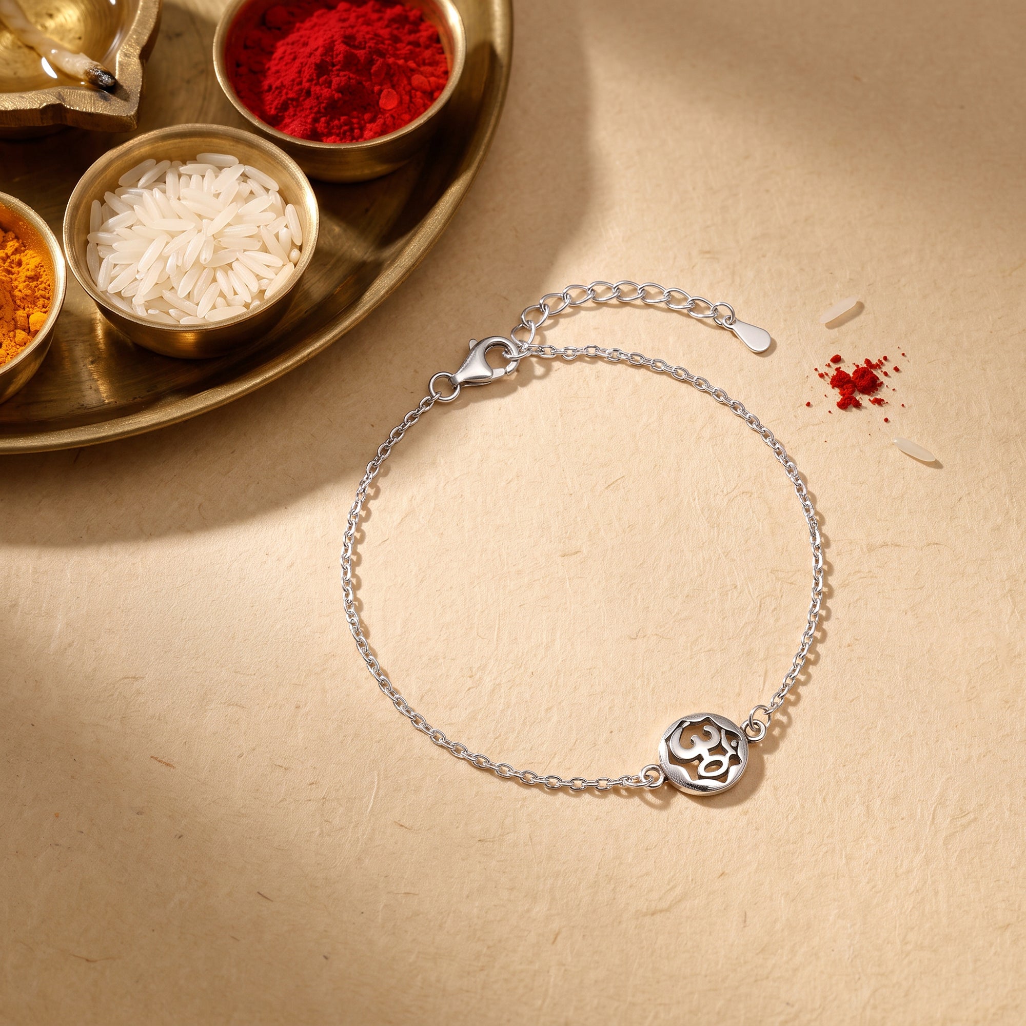 Silver Om Sphere Bracelet Rakhi — image 1