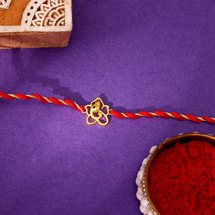 Golden Divine Ganesha Rakhi — image 1