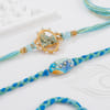 Bal Krishna And Peacock Pastel Meenakari Rakhis - Set Of 2