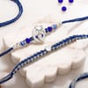Om and Beaded Thread Solitaire Rakhi Set of 2