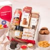 Swastika & Om Rakhi Hamper with Sweet Delights
