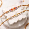 Traditional Beaded & Thread Rakhi Set of 2